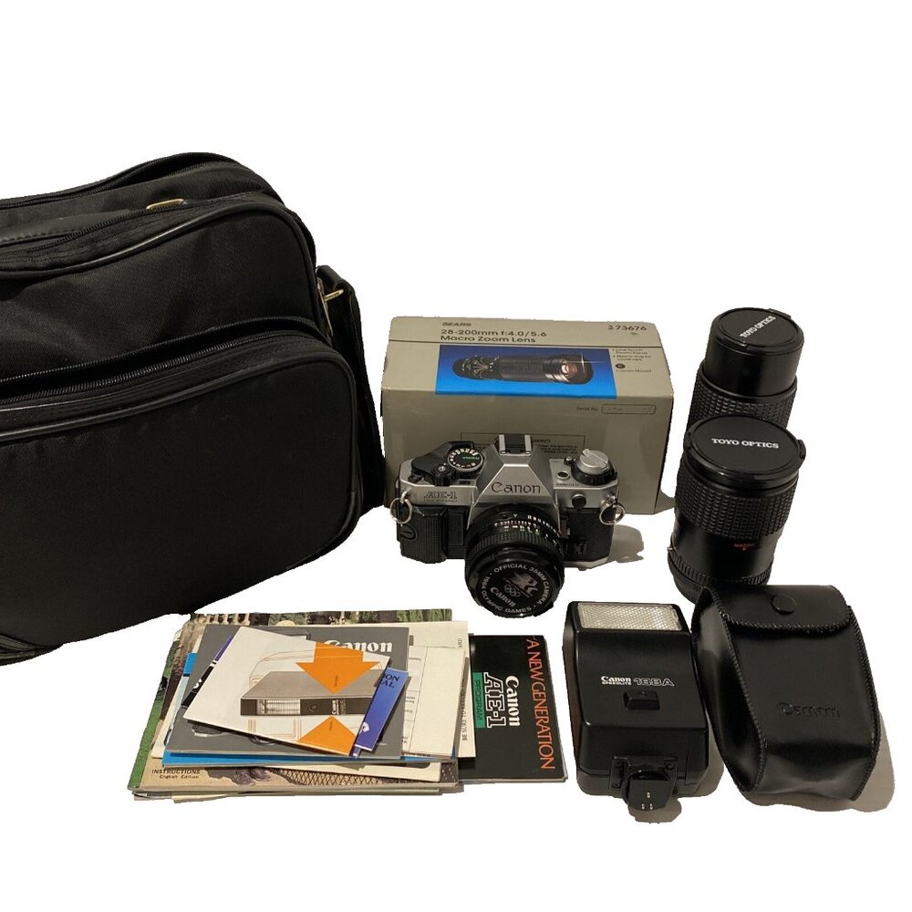 Canon Silver and Black Film Camera Kit with Lenses and Flash